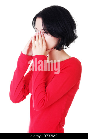 Junge Frau mit Sinus Druckschmerz, isoliert auf weiss Stockfoto