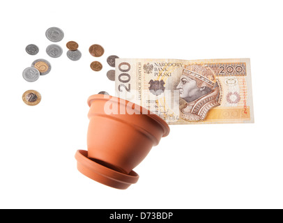 Geld aus Ton-Blumentopf Stockfoto