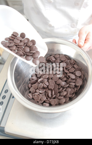 Handewitt, Deutschland, Schokolade Linsen in einer Schokoladenfabrik Stockfoto