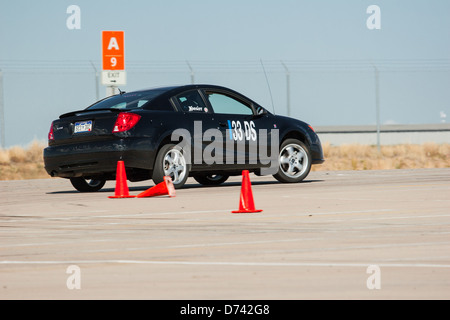 Ein 2006 schwarz Saturn Ion Redline Automobil ein Autocross-Rennen auf eine Regionalveranstaltung Sports Car Club of America (SCCA). Stockfoto