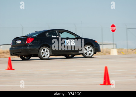 Ein 2006 schwarz Saturn Ion Redline Automobil ein Autocross-Rennen auf eine Regionalveranstaltung Sports Car Club of America (SCCA). Stockfoto