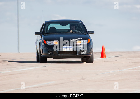 Ein 2006 schwarz Saturn Ion Redline Automobil ein Autocross-Rennen auf eine Regionalveranstaltung Sports Car Club of America (SCCA) Stockfoto