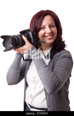 lächelnde Frau mit Digitalkamera Stockfoto