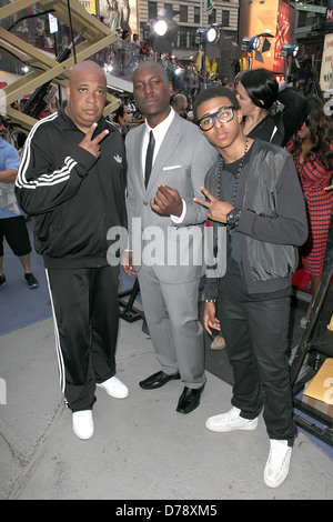 Rev Run Simmons aka Joseph Simmons, Tyrese Gibson und Diggy Simmons NewYork-premiere von "Transformers: Dark Of The Moon" in Stockfoto