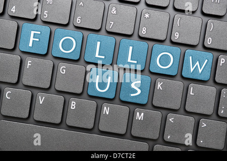 Folgen Sie uns auf der Tastatur Stockfoto