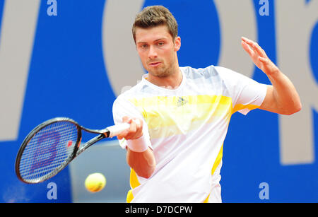 Daniel Brands aus Deutschland kehrt den Ball in das Halbfinale gegen Kohlschreiber aus Deutschland am ATP-Turnier in München, Deutschland, 4. Mai 2013. Foto: MARC Müller Stockfoto