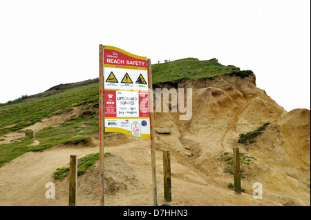 Strand-Warnschild West bay Dorset England uk Stockfoto