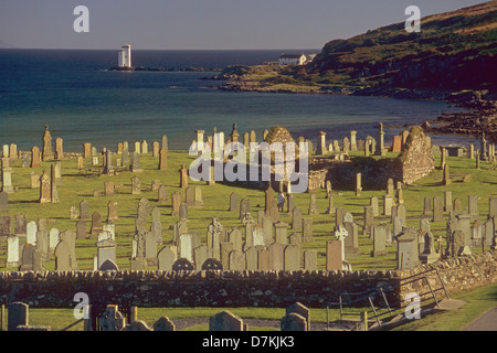 Kilnaughton Kapelle und Carraig Fhada Leuchtturm in der Nähe von Port Ellen auf der Isle of Islay Stockfoto