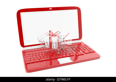 Einkaufswagen und rote Laptop.  Kaufen Online-Konzept Stockfoto