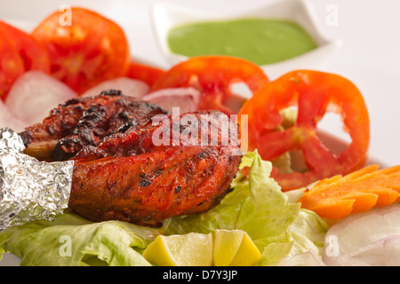 Knusprige Tandoori Chicken. Stockfoto