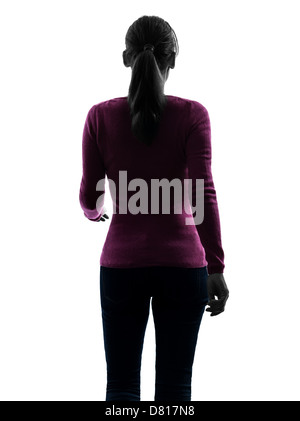 eine Frau zu Fuß hinten im Hochformat in Silhouette Studio isoliert auf weißem Hintergrund Stockfoto