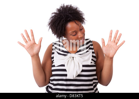 Junge schwarze Frau, die ihre Hände Palm, isoliert auf weißem Hintergrund - afrikanische Bevölkerung Stockfoto