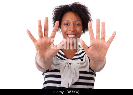 Junge schwarze Frau, die ihre Hände Palm, isoliert auf weißem Hintergrund - afrikanische Bevölkerung Stockfoto