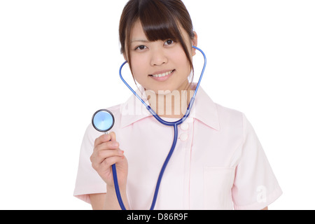 Junge asiatische Krankenschwester mit Stethoskop Stockfoto