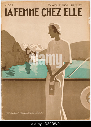 LADY UND KAMERA AM SEE Stockfoto