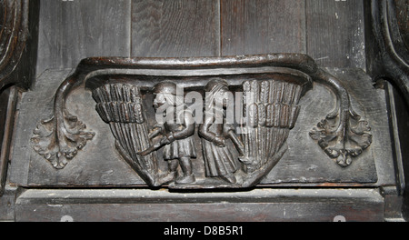 Misericords Sitz ernten August St. Marys Kirche Ripple Worcestershire England UK Stockfoto