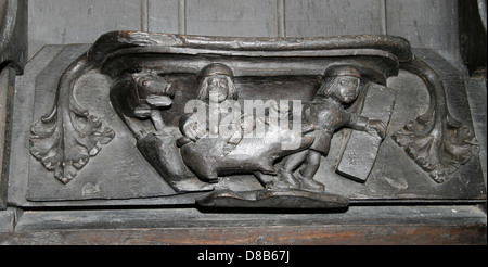 Misericords Sitz Schwein töten November St. Marys Kirche Ripple Worcestershire England UK Stockfoto