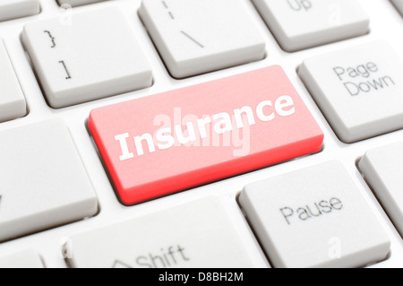 Versicherung auf Tastatur Stockfoto