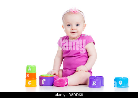 Babymädchen spielen Spielzeug Stockfoto