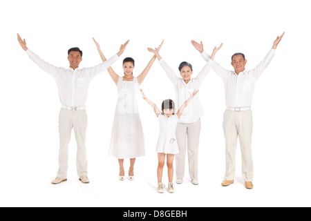 Ganze Familie Hände hoch Stockfoto