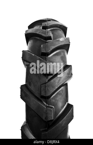 Neue, unbenutzte schwarze Grubber Reifen. Landwirtschaft und Landwirtschaft Hintergrundbild. Stockfoto