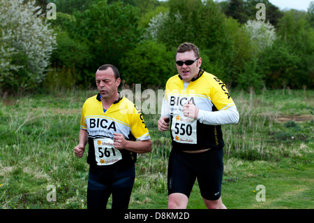 Männer laufen in 2013 Stratford 220 Triathlon Stockfoto