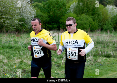 Männer laufen in 2013 Stratford 220 Triathlon Stockfoto