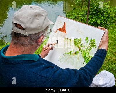 Outdoor-Amateur-Künstler / Maler bei der Arbeit - Frankreich. Stockfoto