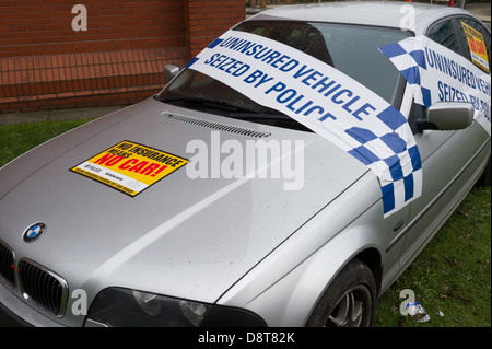 Unversicherte BMW Motor außerhalb Polizeistation beschlagnahmt Stockfoto