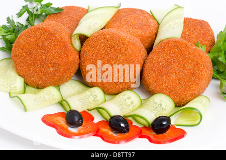 einige Koteletts in Panade - zubereitete Speisen Stockfoto