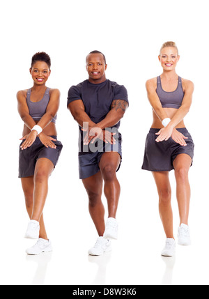 Gruppe von Fit Menschen arbeiten auf weißem Hintergrund Stockfoto