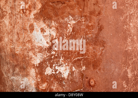 Große Hintergrund für Projektarbeiten, hergestellt aus einer alten orange Wand mit Kratzern Stockfoto