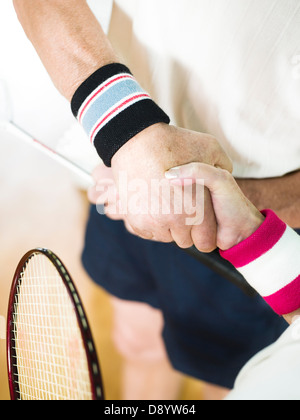 Handshake nach einer Partie Badminton. Stockfoto