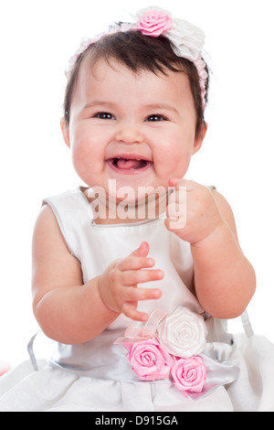 Porträt von lächelndes Babymädchen auf weißem Hintergrund Stockfoto