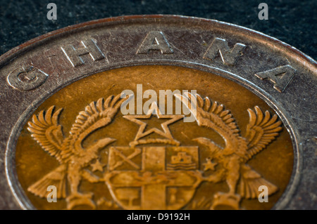 alten ghanaischen Münze, Ghana, in Studioumgebung Stockfoto