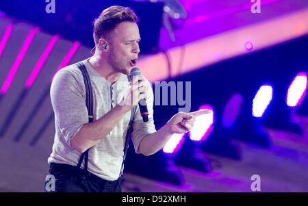 Palma De Mallorca, Spanien, 8 Juni 2013.British Sängerin Olly Murs während der ZDF-Spielshow führt "Wetten, dass...?" (Wetten, dass...?) Át der Stierkampfarena "Coliseo Balear" in Palma De Mallorca, Spanien, 8. Juni 2013. Bildnachweis: Dpa picture Alliance/Alamy Live News Stockfoto