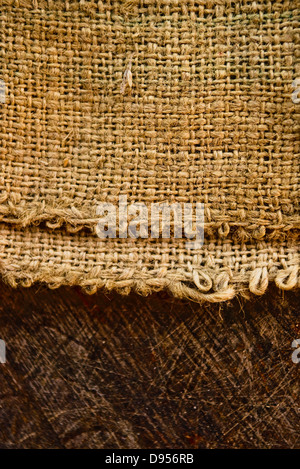 Sackleinen Jute Leinwand Textur und alten Holzstruktur als Hintergrund Stockfoto