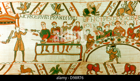 Bayeux 1067. Wilhelm von der Normandie (Wilhelm I. von England) in einem Open-air-Fest mit seine Fürsten und seinem Halbbruder Bischof Odo von Bayeux, die sagen, die Gnade ist. Textile Bettwäsche Essen trinken Kochen Spit Stockfoto