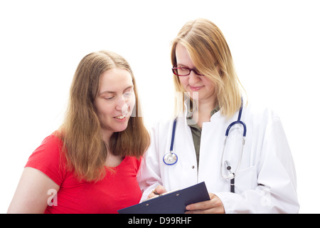 Ärztin, Patientin erklären, Dokument Stockfoto