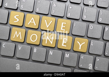 Sparen Sie Geld auf Tastatur Stockfoto