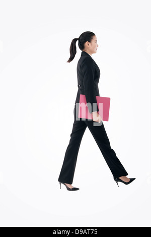 Spaziergang im Mode-Business-Frau Stockfoto