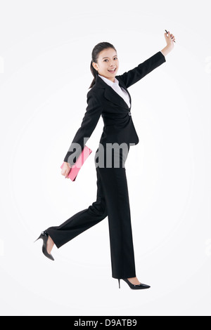 Spaziergang im Mode-Business-Frau Stockfoto
