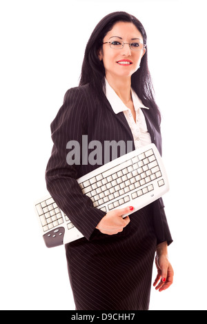 Pädagogisches Konzept - berufstätige Frau im schwarzen Anzug mit Tastatur. Stockfoto