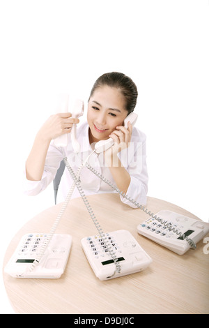 Business-Dame am Telefon Stockfoto