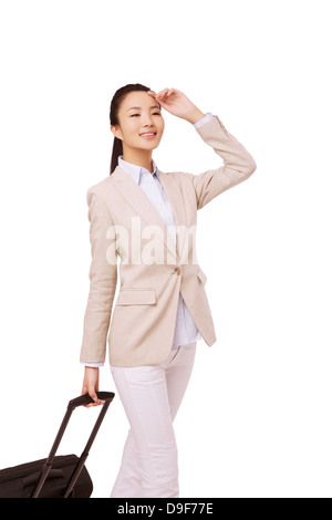 junge Frau Holding Koffer Stockfoto