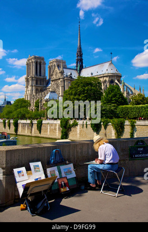 Künstler von am Ufer mit Blick auf Notre Dame, Paris, Frankreich Stockfoto