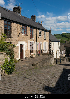 Reihen von Hütten in Kapelle-En-le-Frith einer Kleinstadt in Derbyshire, England Stockfoto