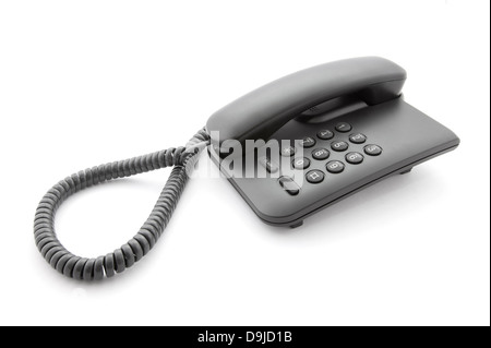 Schwarzer Büro Telefon mit weichen Schatten auf weiß Stockfoto