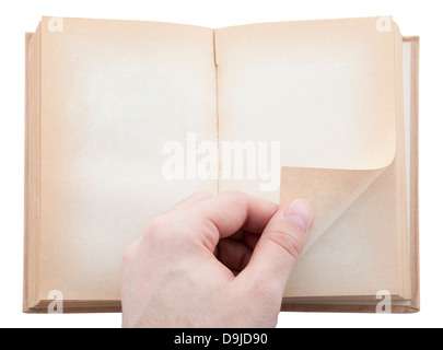 Hand drehen alte leere Buchseite. Clipping-Pfad enthalten. Stockfoto