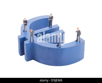 Geschäftsmann am blauen Euro-symbol Stockfoto